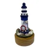 Blue and white striped lighthouse model, wooden base, nautical theme decoration, including rudder, shell and fishing net Item Picture